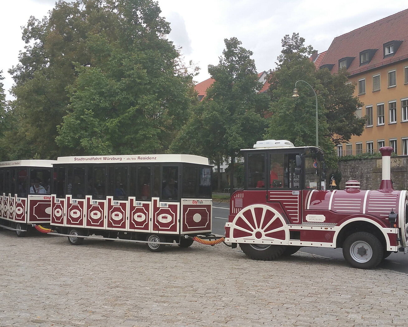Würzburg city train for sightseeing tours in historic surroundings