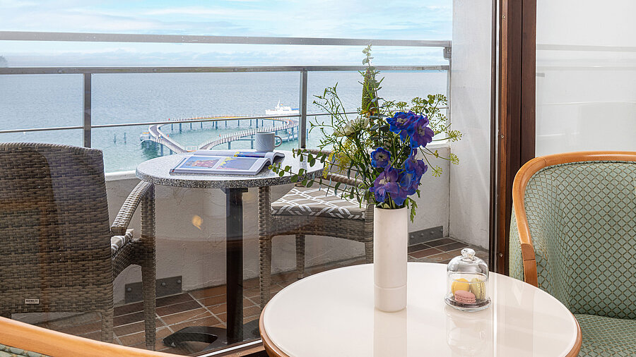 Balcony at Maritim Seehotel Timmendorfer Strand with sea view, flowers and seating