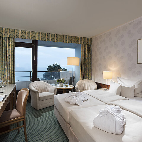 Superior room with sea view, double bed, and balcony at Maritim Seehotel Timmendorfer Strand.