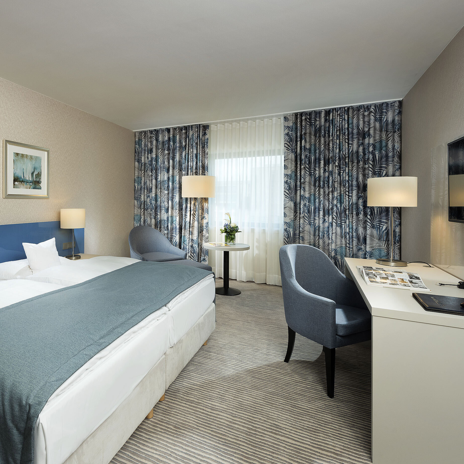 Superior room Superior room at Maritim Hotel Bonn with stylish design, cozy beds, modern desk, and comfortable seating area.