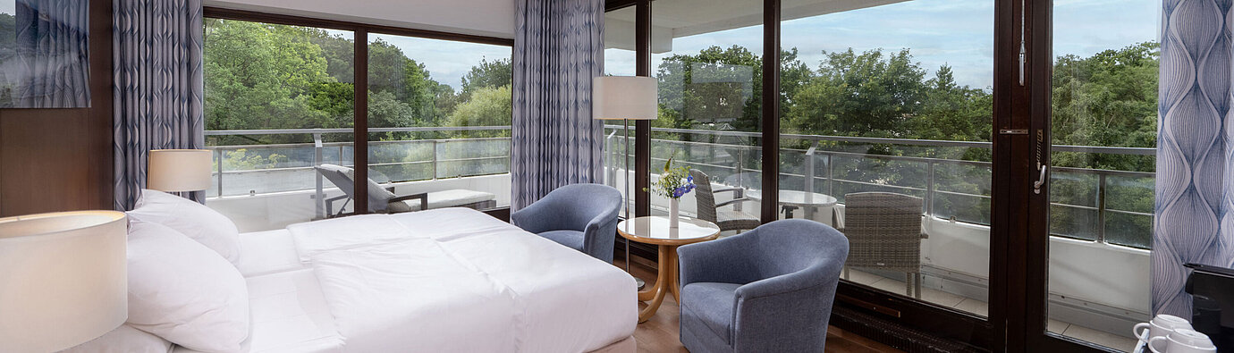 SuperiorPlus room Bright room at Maritim Seehotel Timmendorfer Strand with large balcony and garden view
