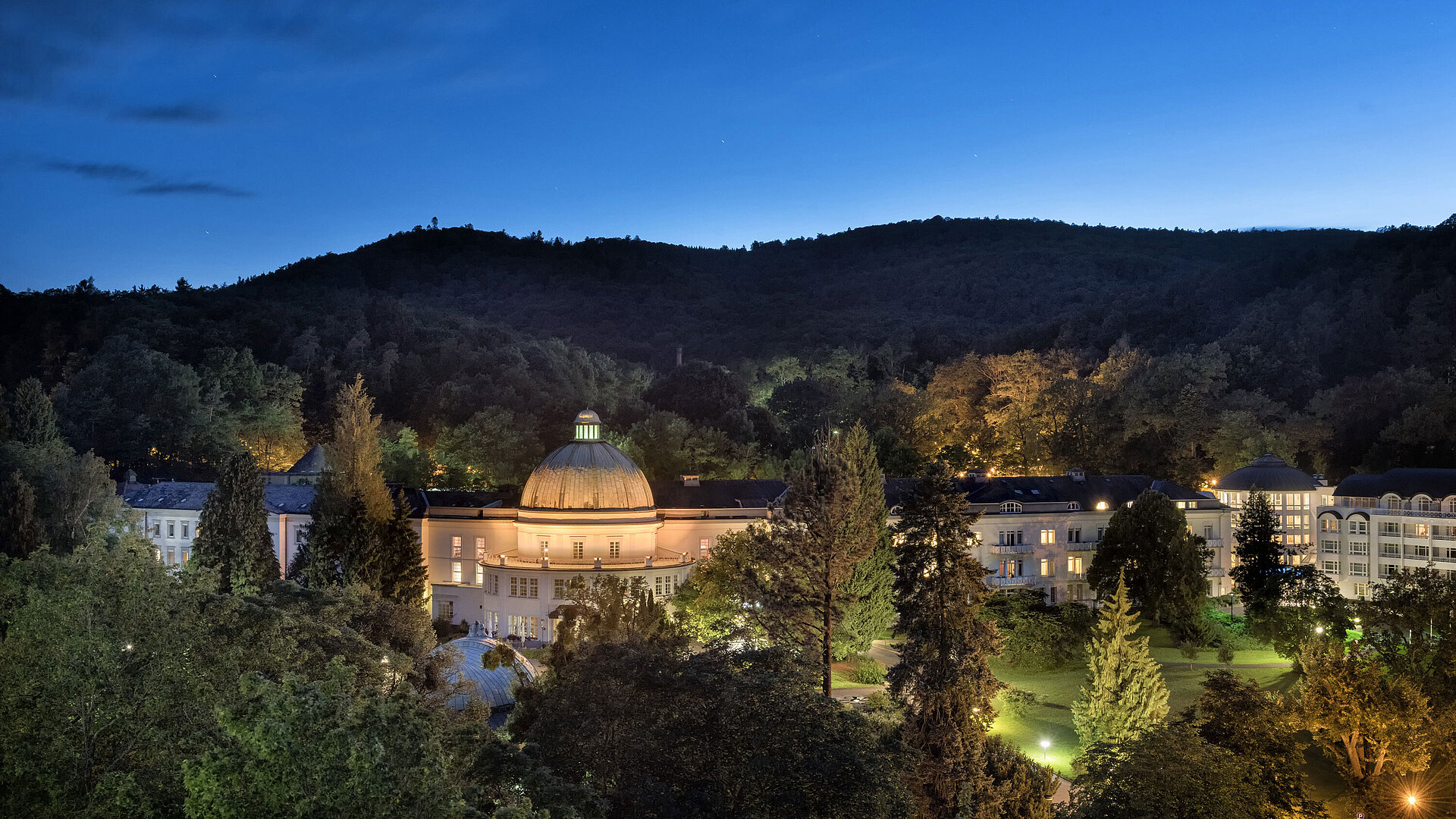Exterior view at night Maritim Hotel Bad Wildungen at night, beautifully lit and surrounded by nature