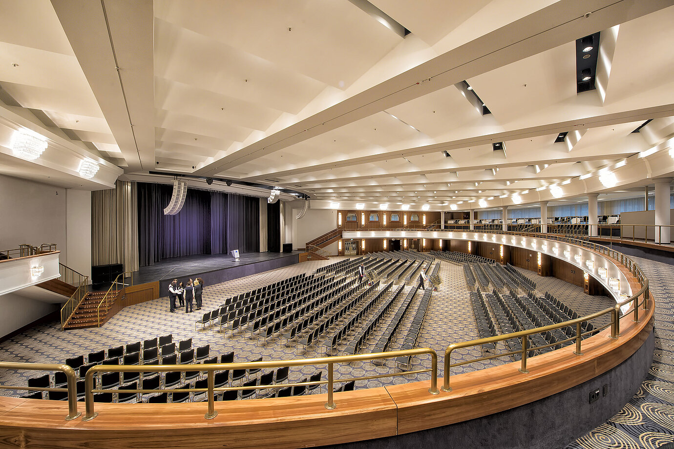 Maritim Hall at Maritim Hotel Bonn, with row seating and a stage, perfect for conferences and large events.