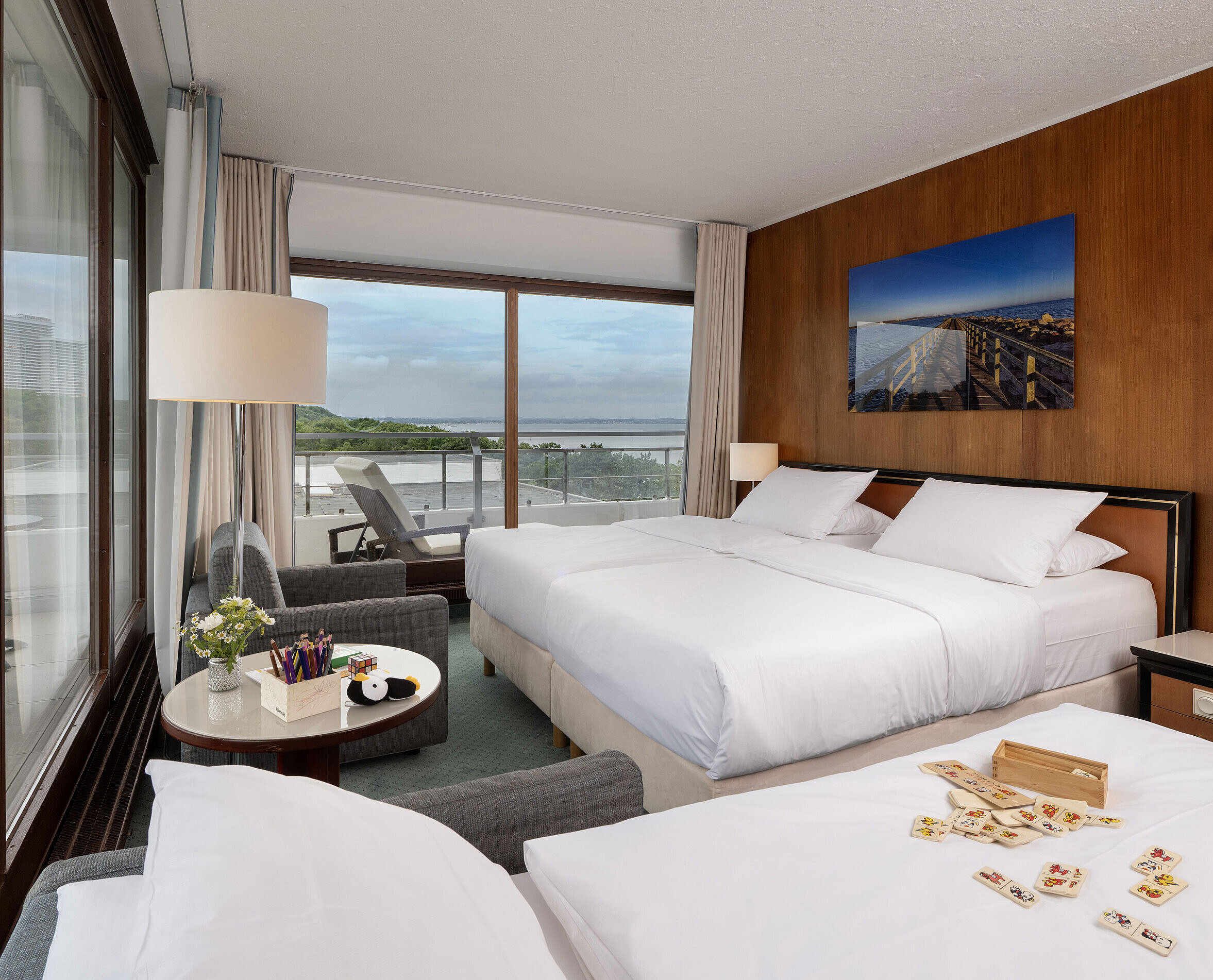 Family room Bright family room at Maritim Seehotel Timmendorfer Strand with balcony and Baltic Sea view