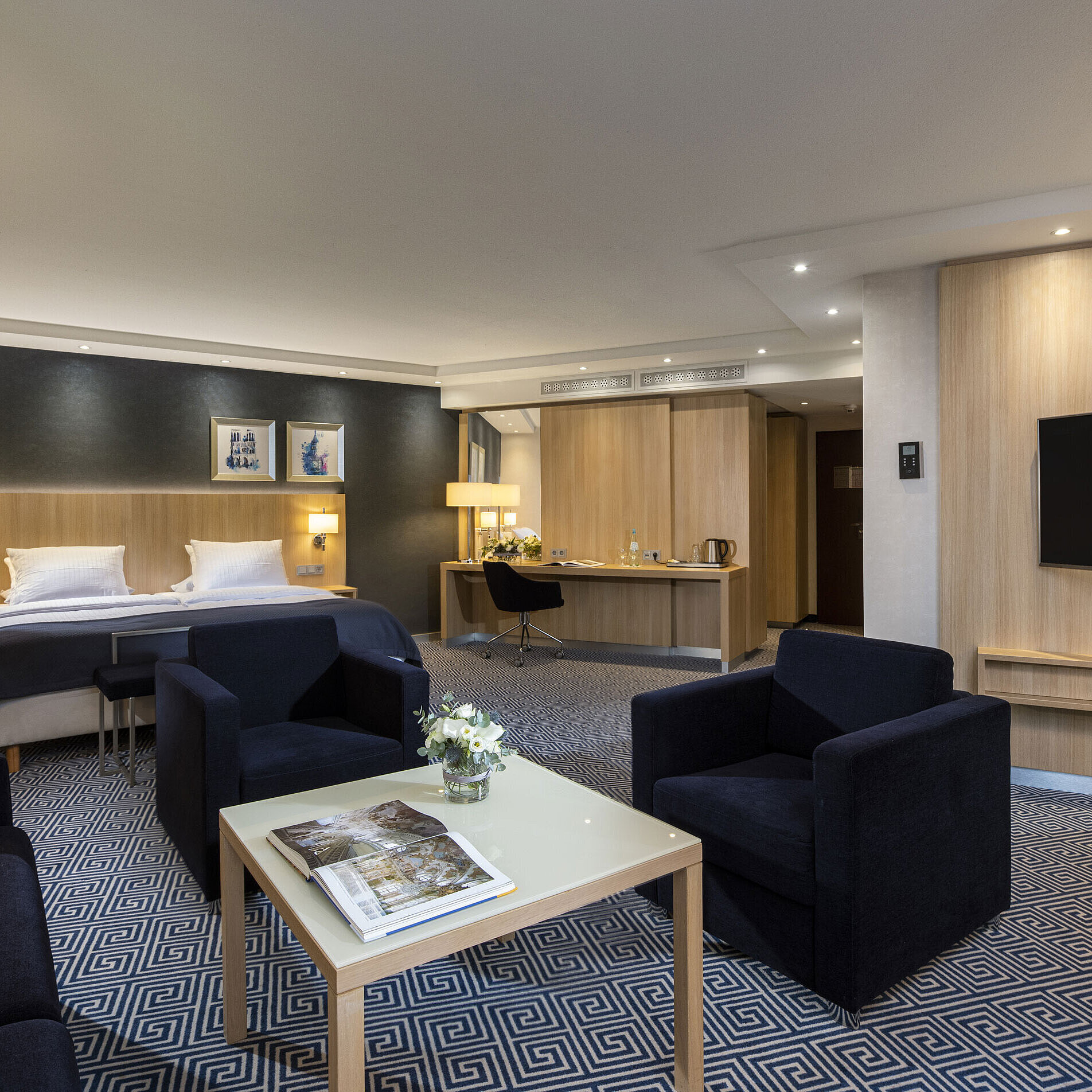 Junior Suite Spacious Junior Suite at Maritim Hotel Würzburg with a double bed and cozy seating area
