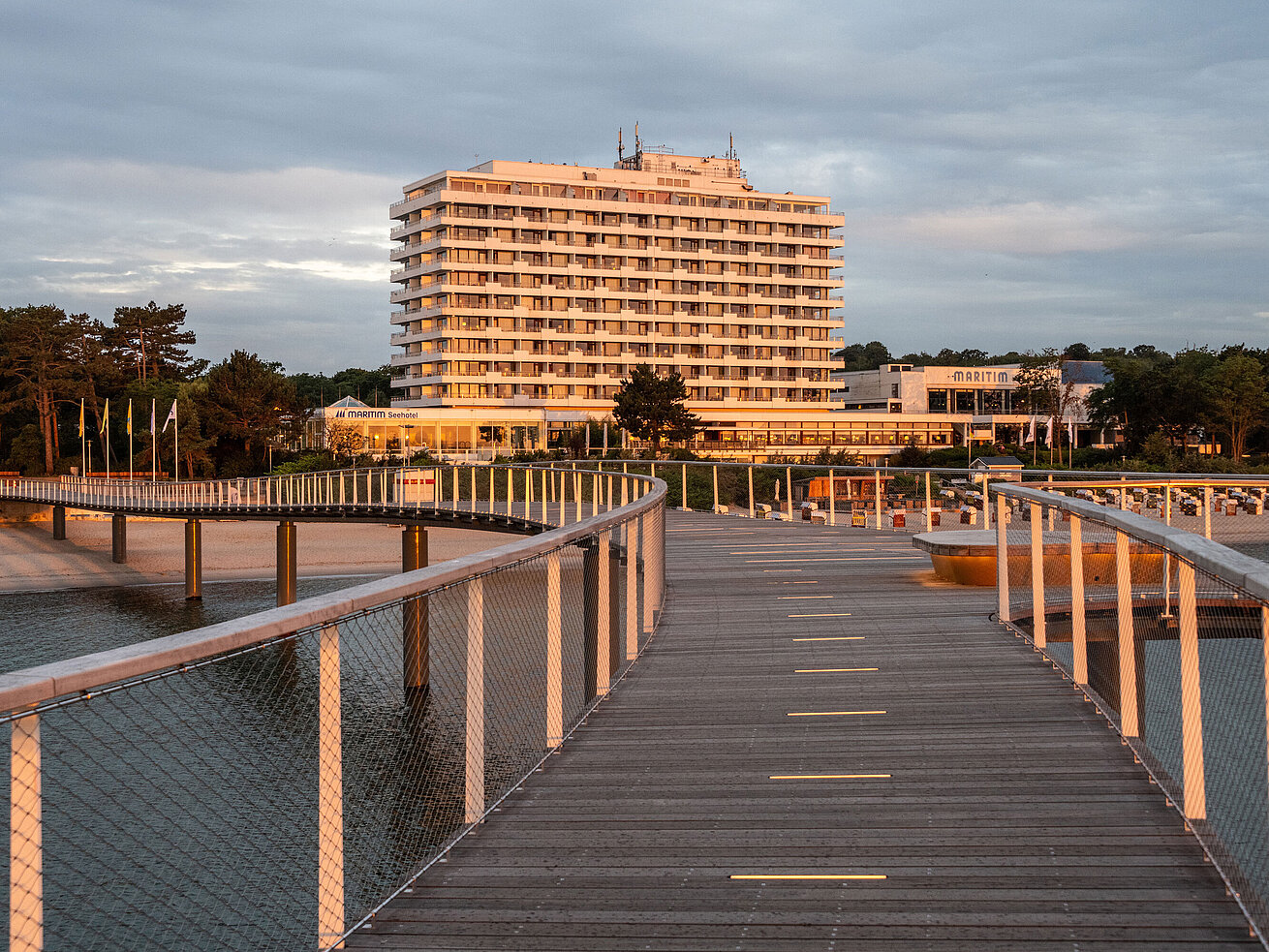 Pier Maritim Seehotel Timmendorfer Strand seen from the pier with beach and Baltic Sea view