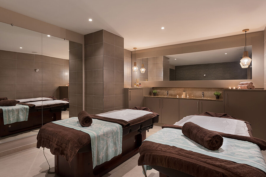Spa area Elegant spa area at Maritim Antonine Hotel & Spa Malta with two massage beds, a warm ambience and a relaxing atmosphere.