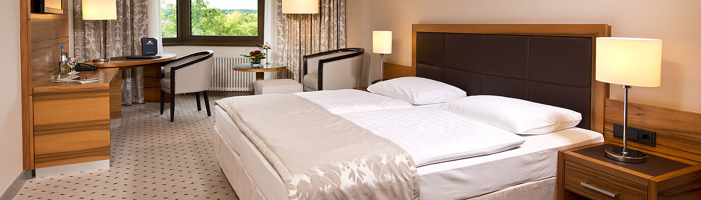 Superior room Comfortable hotel room at Maritim Hotel Bad Homburg with modern design and green view.