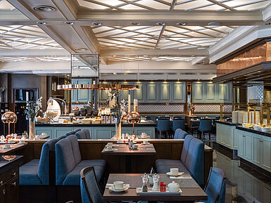 Restaurant Landgraf Elegant interior and buffet area of Restaurant Landgraf at the Maritim Hotel Darmstadt. Cozy seating areas.